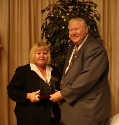 Connie Moser shares the news of her award with Neabsco District Supervisor John Jenkins